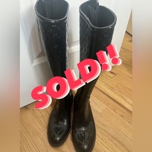 Louis Vuitton riding rain boots. Wore these boots like 3 times.